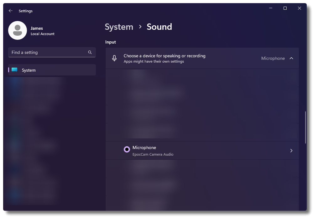 Sound settings window with microphone options.